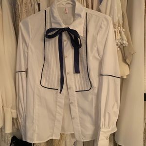 White button up with ribbon tie and piping detail